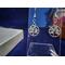 Round dangle earrings with a rhinestone encrusted leaf pattern in the center on stainless steel fish hook ear wires.