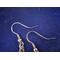 Detail of stainless steel fish hook ear wire.