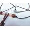 Brown leather cord with rose quartz beads and a stainless steel lobster clasp.
