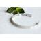 Sterling silver cuff bracelet stamped with Elle Est Forte and Prov 31:25.