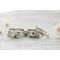 Free formed organic shaped sterling silver ring stamped with name and hearts. 