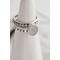 Sterling silver ring with oval faceted moonstone set in a bezel setting with two separate complimentary silver patterned ring band to stack.