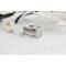 Sterling silver ring with oval faceted moonstone set in a bezel setting with two separate complimentary silver patterned ring band to stack.