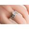 Sterling silver ring with oval faceted moonstone set in a bezel setting with two separate complimentary silver patterned ring band to stack.