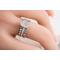 Sterling silver ring with oval faceted moonstone set in a bezel setting with two separate complimentary silver patterned ring band to stack.