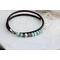 Triple wrap leather cord bracelet made with aqua blue amazonite beads sterling silver accents, and a handcrafted sterling silver hook clasp.