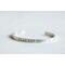 Sterling silver cuff bracelet stamped with Elle Est Forte.