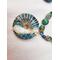 Wire wrapped green jade donut pendant
