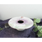 photo of kiln-fired copper enamel ikebana-style vase with hand painted hibiscus on top with is 4 inches in diameter. Enamel colors of hibiscus are pale pink and lavender, with pale green leaves. Vase stands 1-1/4 inch tall. There is a pin-frog inside to hold flowers upright.