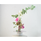photo of kiln-fired copper enamel ikebana-style vase with hand painted hibiscus on top with is 4 inches in diameter. Enamel colors of hibiscus are pale pink and lavender, with pale green leaves. Vase stands 1-1/4 inch tall. There is a pin-frog inside to hold flowers upright.