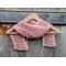 Another pic of a pink scarf with a zig zag pattern.