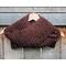 Another pic of a brown scarf with a zig zag pattern.