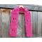 Display of the Tulip Crochet Scarf Pattern on a hanger in front of a wooden fence.