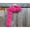 Another pic of a pink scarf with tulips along its length.