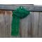 Another pic of a green scarf with leaves along its length.