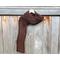 Another pic of a brown scarf with a zig zag pattern.