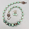 Necklace set: Raku focal nuggets, Burma jade rounds, turquoise rondelles, copper spacer beads and artisan-forged clasp
