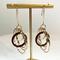 Madera Design Studio's Circles Earrings are a pair of unique, bold, dangle hoop earrings. Handmade in Philadelphia by a small local studio. 