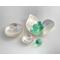 Set of three nesting trinket dishes made from a vintage silverplated brass serving tray. Largest dish is a bird shape, two smaller dishes are round. Photo shows all three side by side, the bird shaped dish has three turquoise marbles in it.