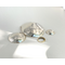 Backside of three nesting trinket dishes made from a vintage silverplated brass serving tray. Largest dish is a bird shape, two smaller dishes are round. Photo shows the backs of all three, my I Love You ring is shown for size comparison only