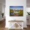 Oxbow Bend in Grand Teton National Park. Mount Moran rising above the snake river, showing a beautiful reflection in the water, with wildflowers in the foreground
room mockup shown