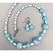 Necklace set | Mid-century "snow-sprinkled" Cherry Brand rounds, pale blue opaline rounds, twisted ovals