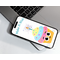 pink blue and yellow icing on a cupcake with large smiling eyes, sparkling candle on top, caption showing make a wish on a cellphone