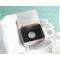 photo shows my gloved hand holding a silver trinket box which is open and showing a dime inside