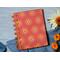 A small Blank notebook with a sunburst cover