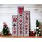 A decoupage wood sign that has wooden letters that says warm winter wishes.