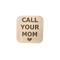 wooden magnet engraved with message call your mom with a heart at the bottom