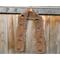 Display of the Dad Crochet Scarf on a hanger in front of a wooden fence.