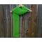 Display of the Grid Crochet Scarf on a hanger in front of a wooden fence.