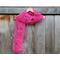 Another pic of a pink scarf with tulips along its length.