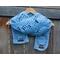 Yet another pic of a blue scarf with snowmen along its length.