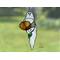 Ghost with pumpkin shown in window in direct sunlight.