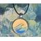 Vitage style round wooden necklace made of wood in a silver stainless steel 1" cabochon with black leather necklace. Green and blue waves.