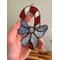 Close up of Candy Cane ornament.