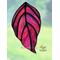 Dogwood stained glass ornament in direct sunlight.