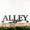 Aviator pilot family name metal sign with propeller, in silver vein powder coat.