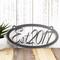 Oval established year metal plaque, in silver vein powder coat.