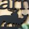 Close up of matte black powder coat of our buck and doe deer metal wall art.