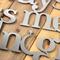 Close up of raw steel on our Always Kiss Me Goodnight metal wall art.