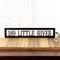 Rectangular metal address sign in matte black powder coat.
