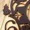 Close up of copper vein powder coat on our metal monogram plaque.