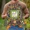 Man holding a fall tobacco basket wreath with berries, greenery, and a rustic 'Fall Is In The Air' sign. Farmhouse autumn wreath.