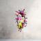 Bright and festive Halloween ghost wreath with purple, pink, and green accents. Handmade front door decoration for spooky Halloween fun.