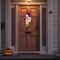 Handcrafted ghost wreath with colorful 'Boo' sign, ideal for brightening up your front door. Halloween wreath with purple and green sparkle.