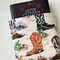 a large book peeking out of the western book cover