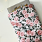 a medium size book is peeking out the floral book jacket